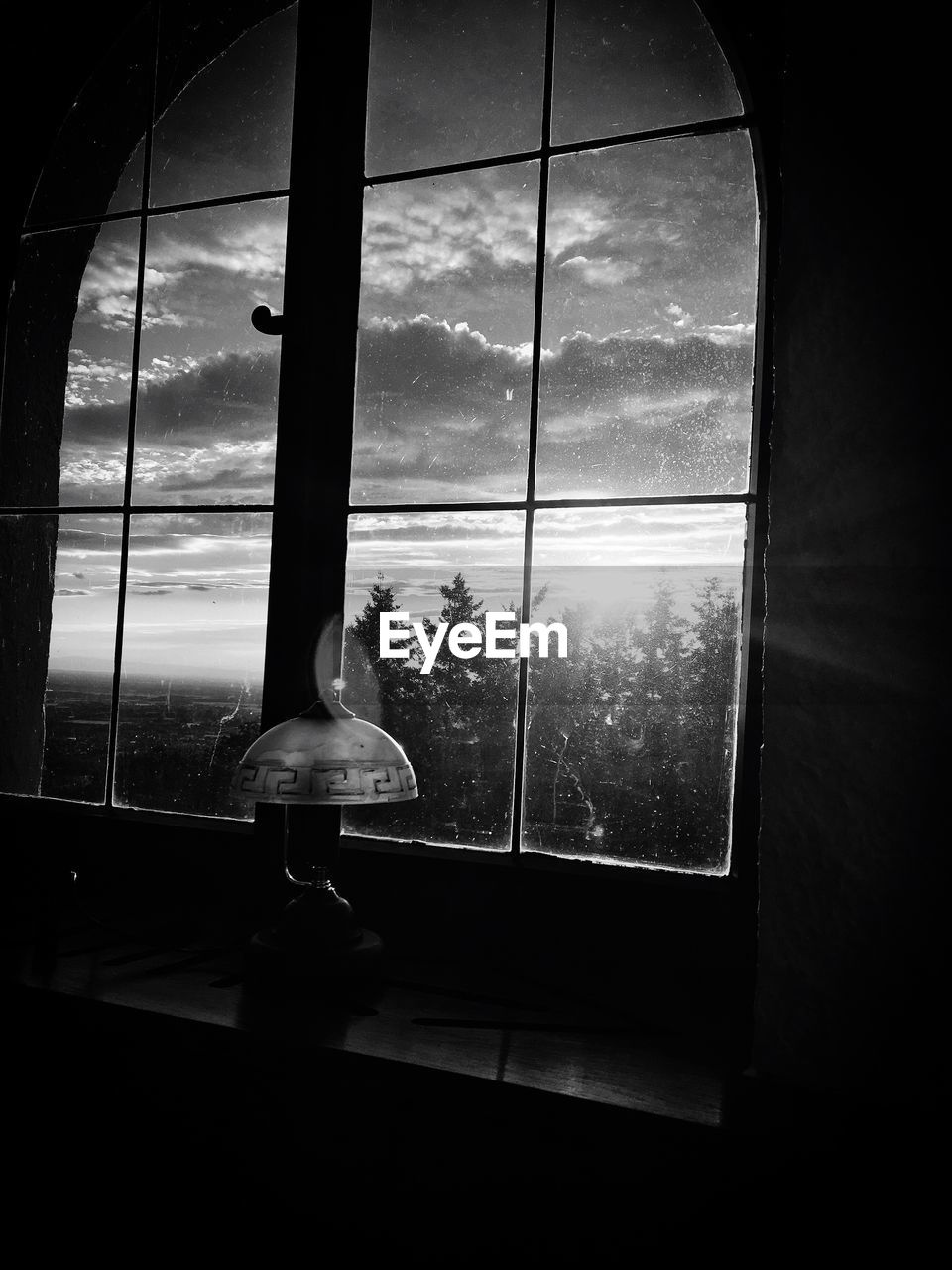 CLOSE-UP OF WINDOW AGAINST SKY SEEN THROUGH GLASS