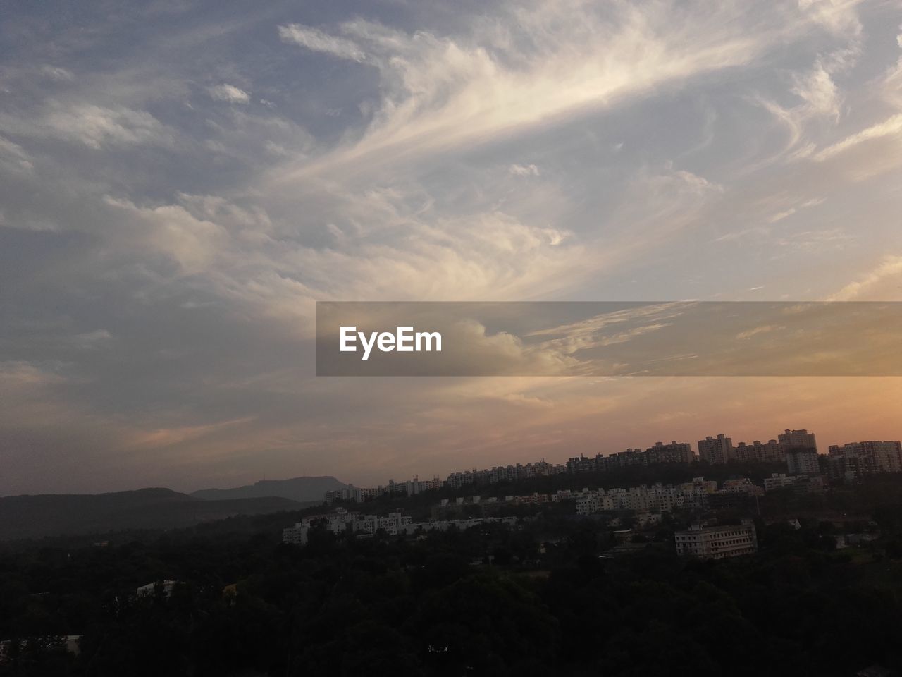 Scenic view of landscape against sky during sunset