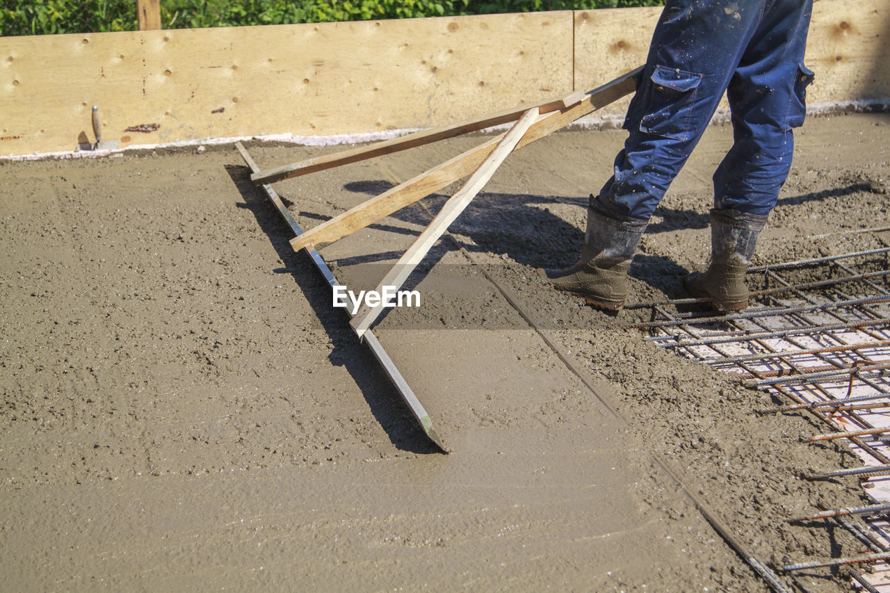 LOW SECTION OF MAN WORKING