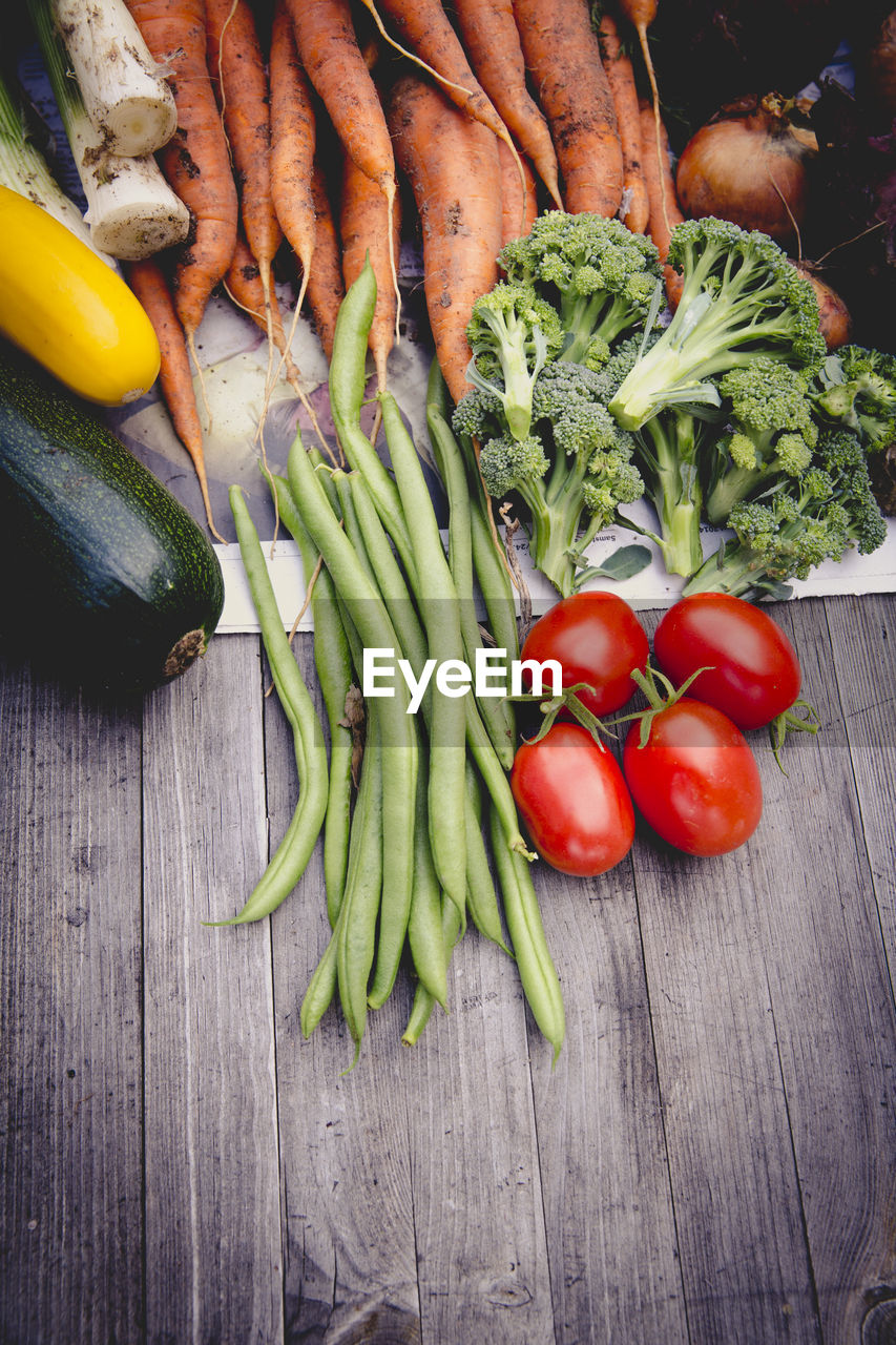 High angle view of vegetables on wooden table