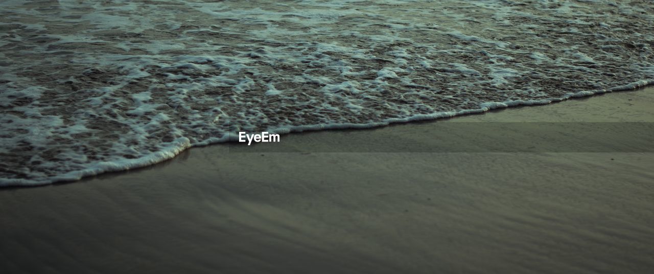 Close-up of water at beach