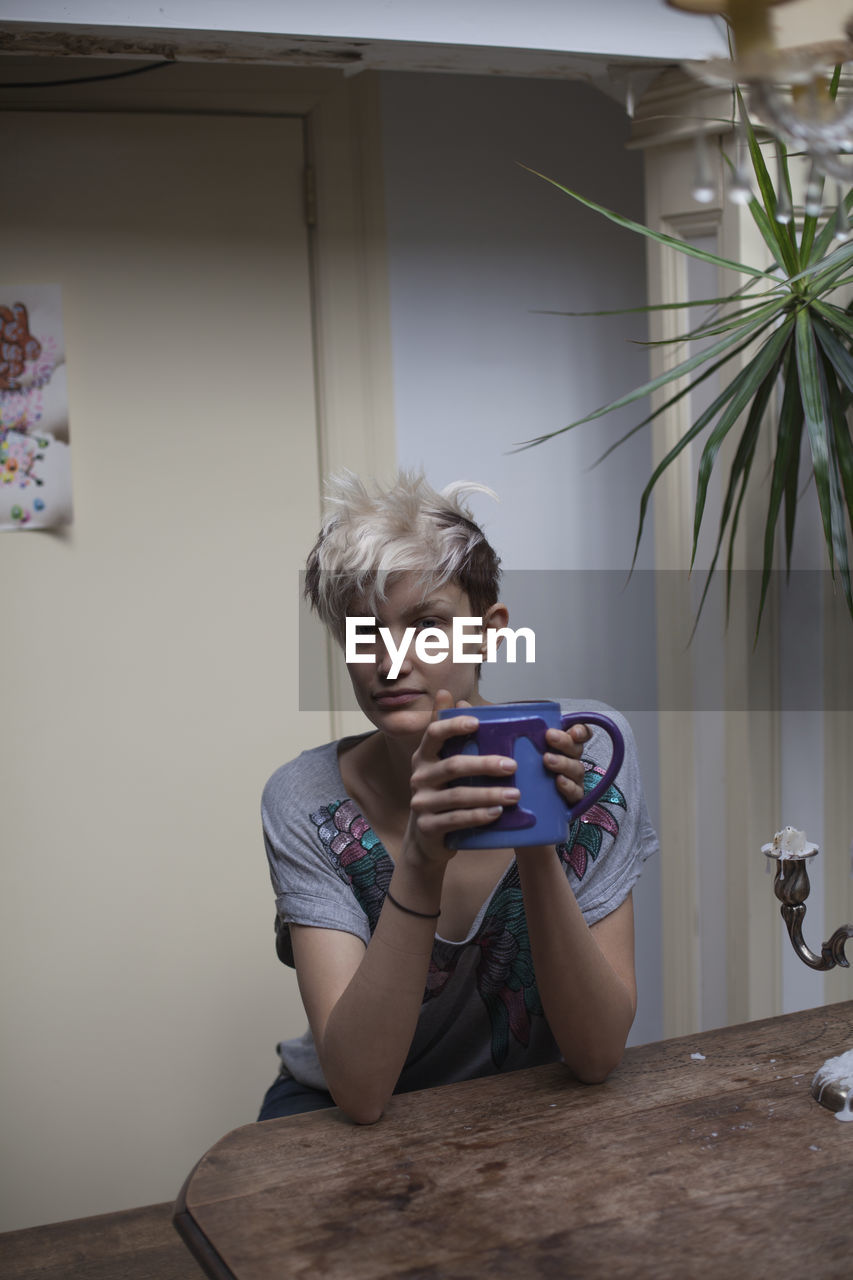 Young woman hanging out in her apartment