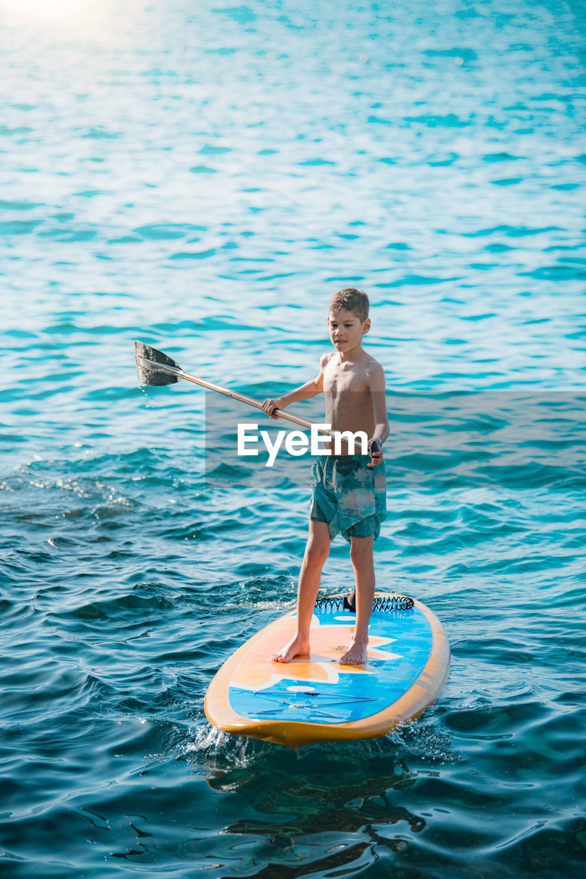 Man surfing in sea