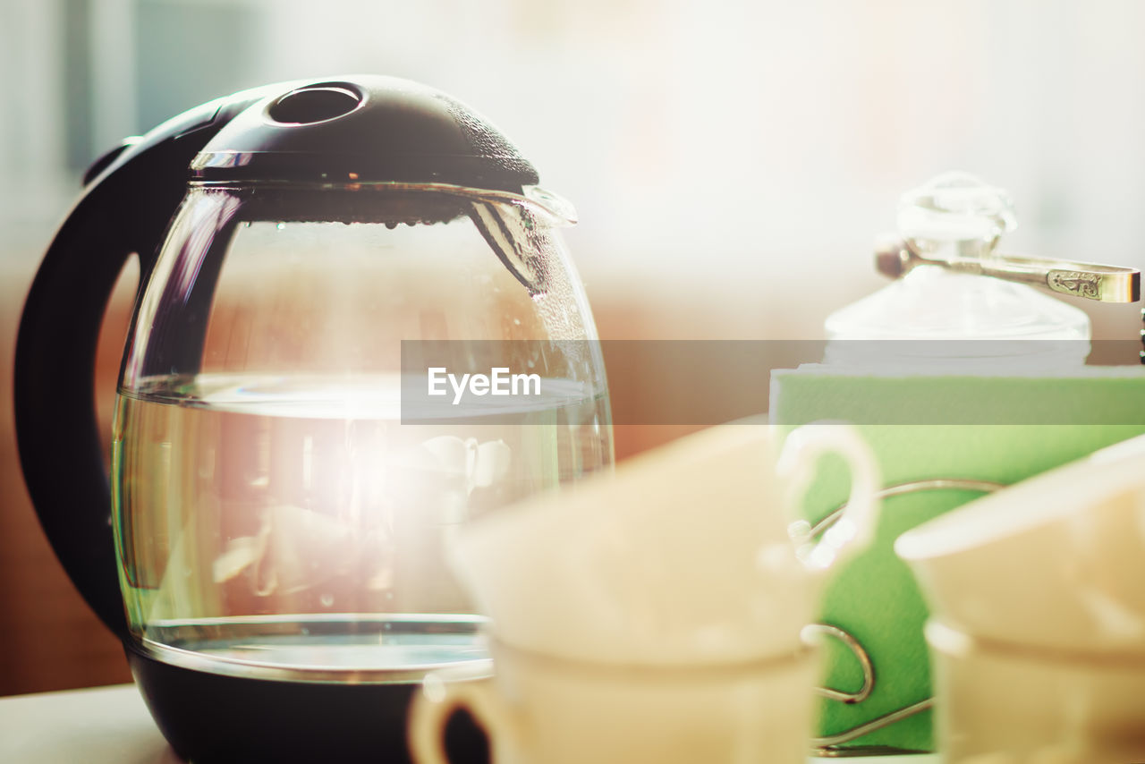 CLOSE-UP OF COFFEE SERVED ON TABLE AT HOME