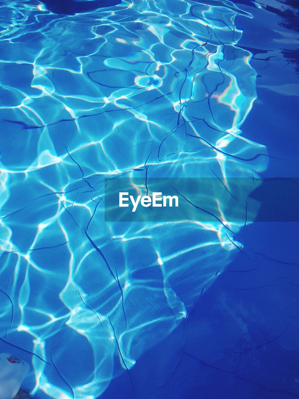 High angle view of blue water in swimming pool