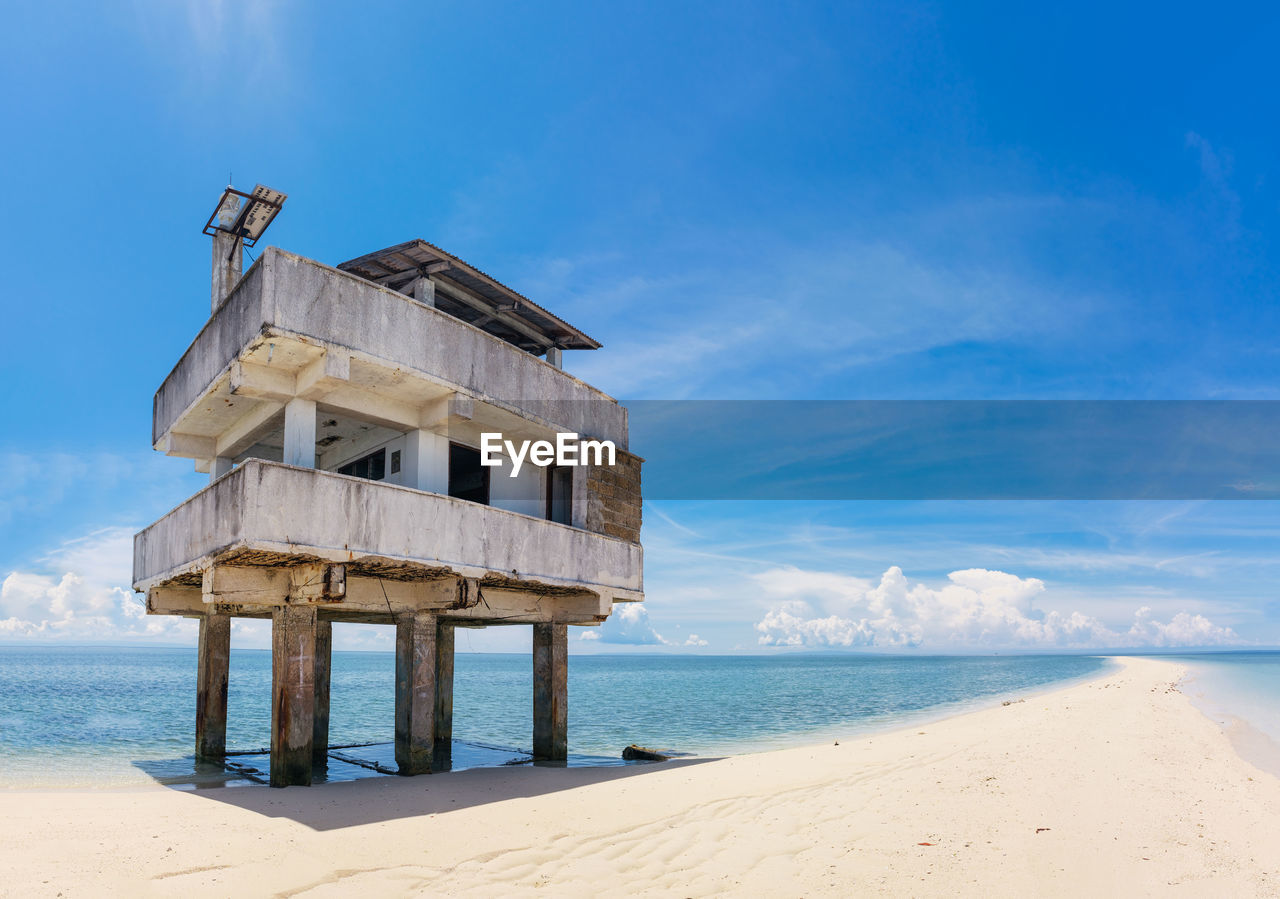 GAZEBO AT BEACH AGAINST SKY