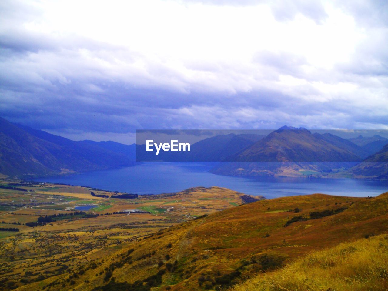 SCENIC VIEW OF MOUNTAIN RANGE AGAINST SKY