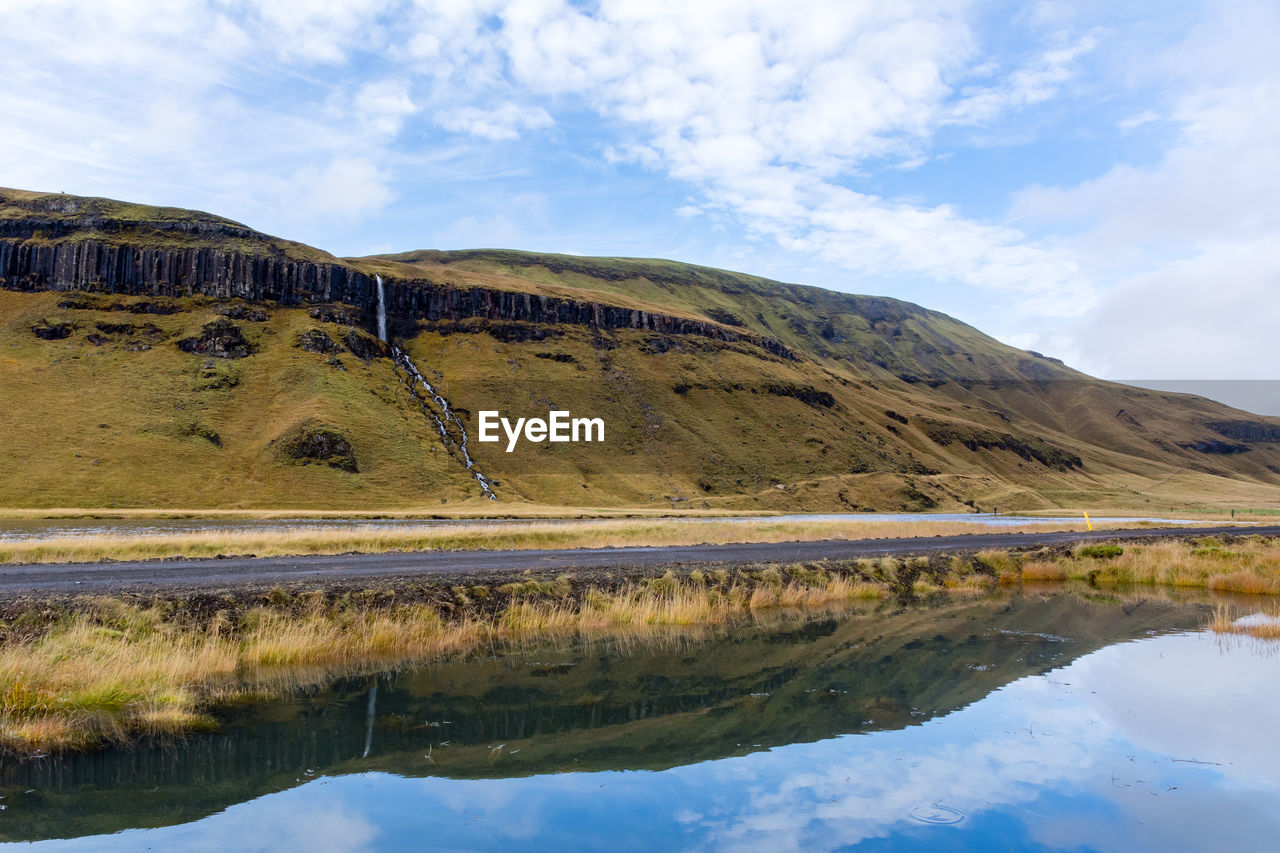 Scenic reflection of landscape in calm lake