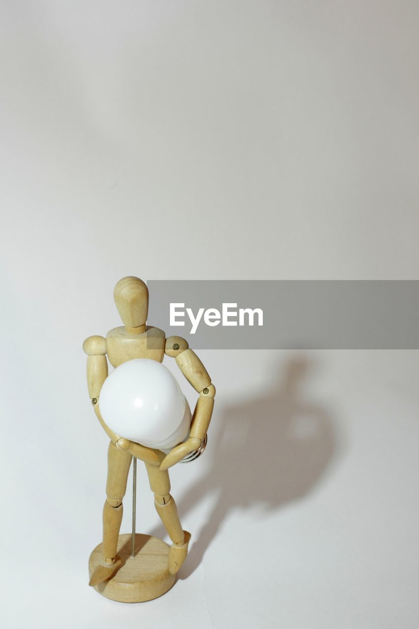 indoors, gold, studio shot, no people, copy space, single object, jewellery, white background, fashion accessory, figurine