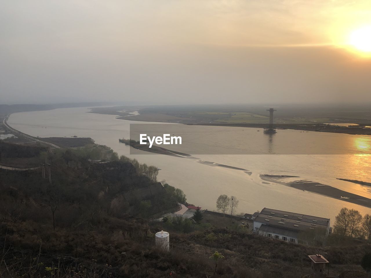 HIGH ANGLE VIEW OF SEA DURING SUNSET