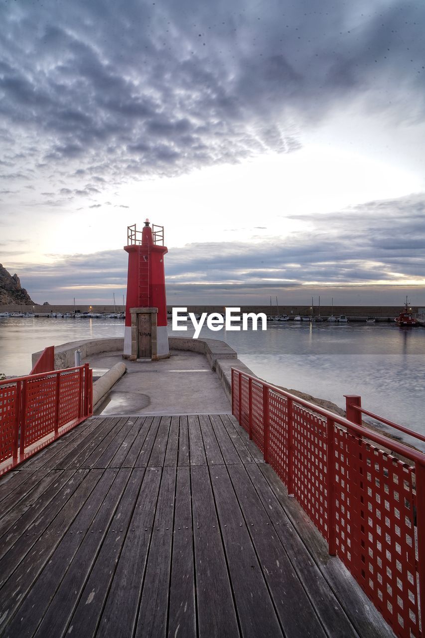 Pier over sea against sky