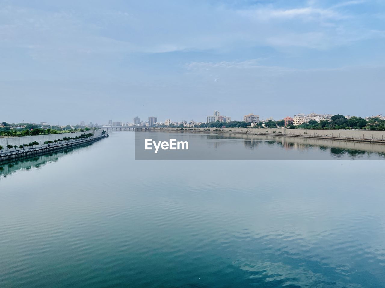 water, sky, architecture, sea, built structure, shore, nature, horizon, building exterior, reflection, waterfront, bay, building, no people, day, body of water, cloud, scenics - nature, beauty in nature, travel destinations, city, coast, reservoir, outdoors, tranquility, blue, travel, tranquil scene, land, environment, tourism, landscape