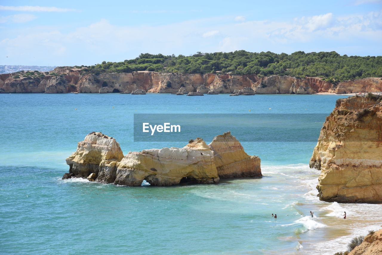 SCENIC VIEW OF SEA AND ROCKS