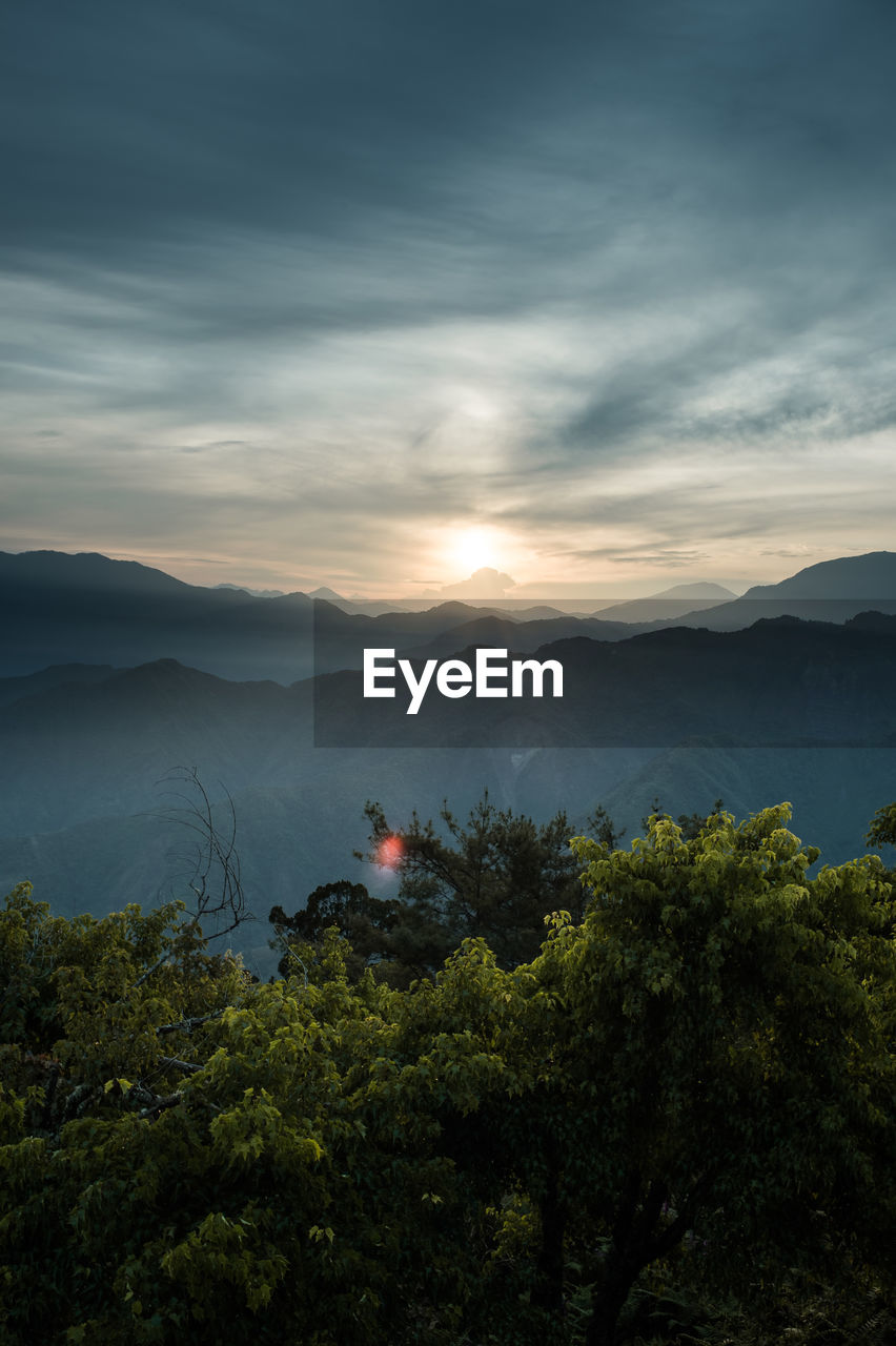 Scenic view of mountains against sky during sunset