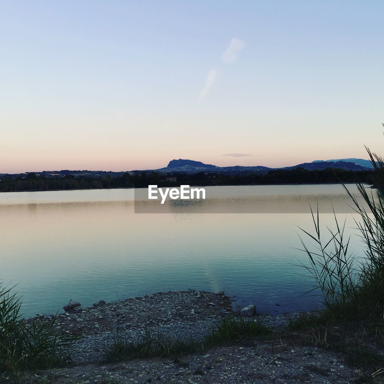 LAKE AGAINST SKY DURING SUNSET