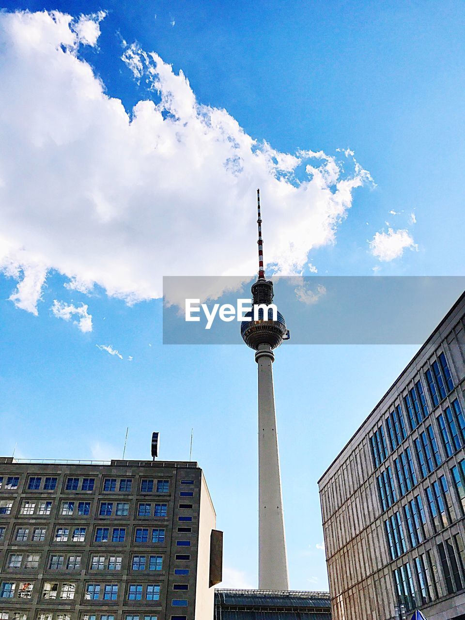 LOW ANGLE VIEW OF COMMUNICATIONS TOWER AGAINST SKY