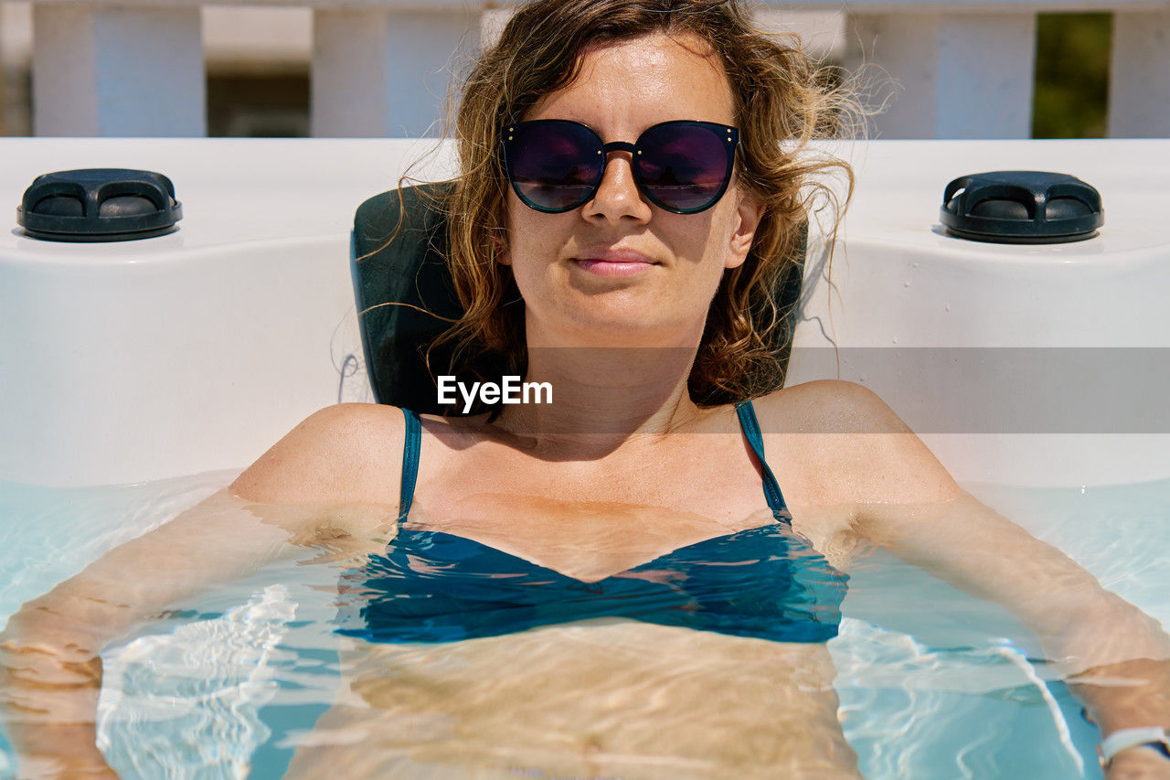 portrait of woman swimming in sea