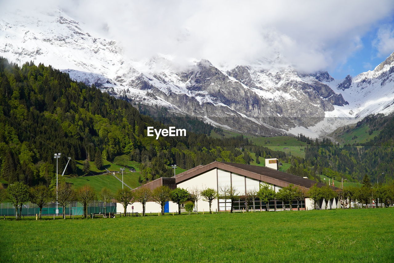 SCENIC VIEW OF SNOWCAPPED MOUNTAIN AGAINST SKY