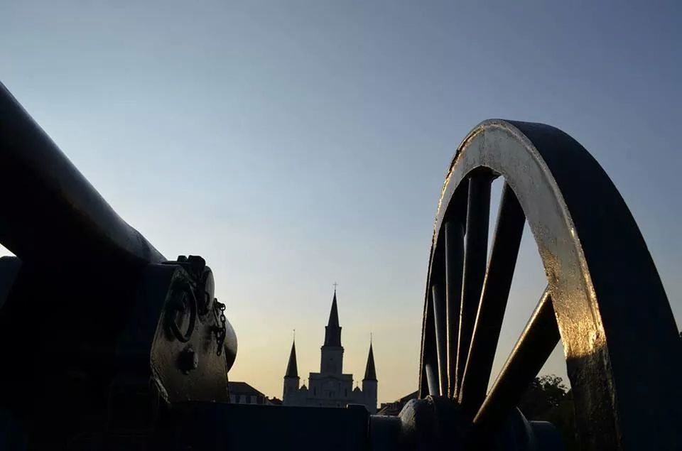 LOW ANGLE VIEW OF WOMAN AGAINST SKY