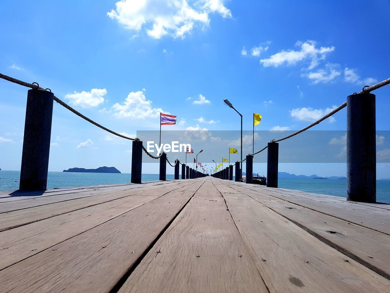 Scenic view of pier on sea against sky