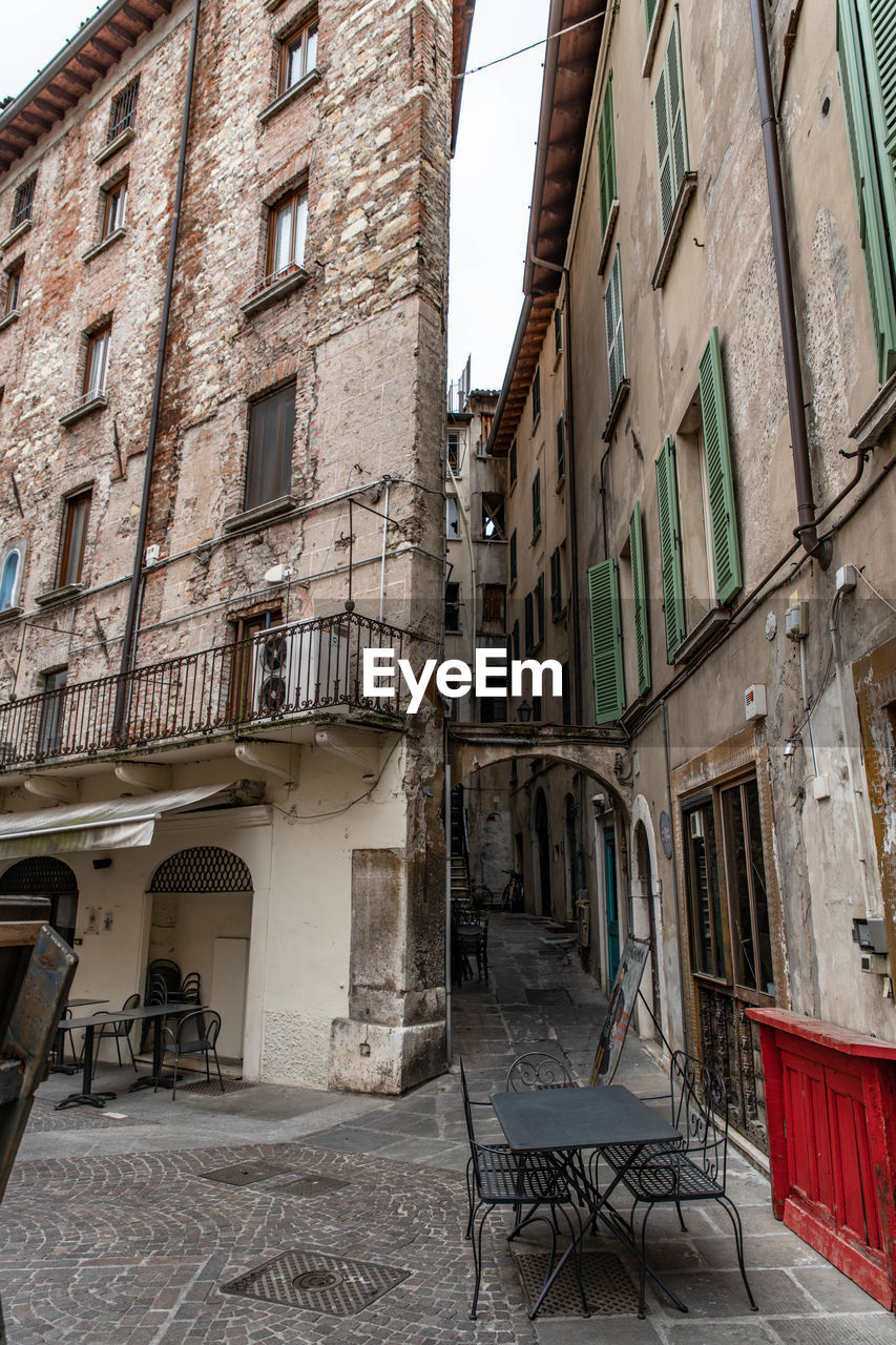 LOW ANGLE VIEW OF OLD BUILDING WITH STREET