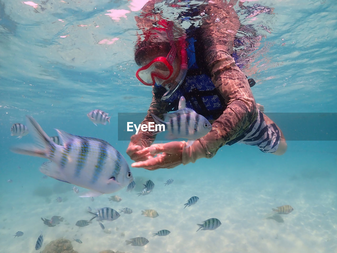 Woman swimming in sea