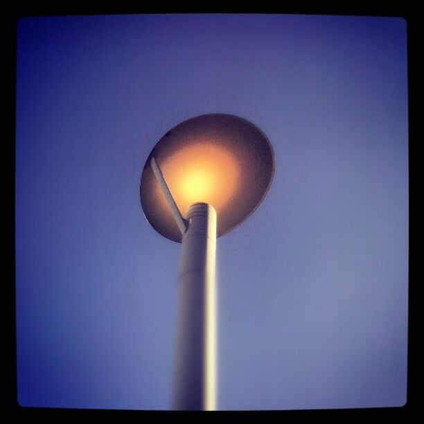 LOW ANGLE VIEW OF STREET LIGHT AGAINST BLUE SKY