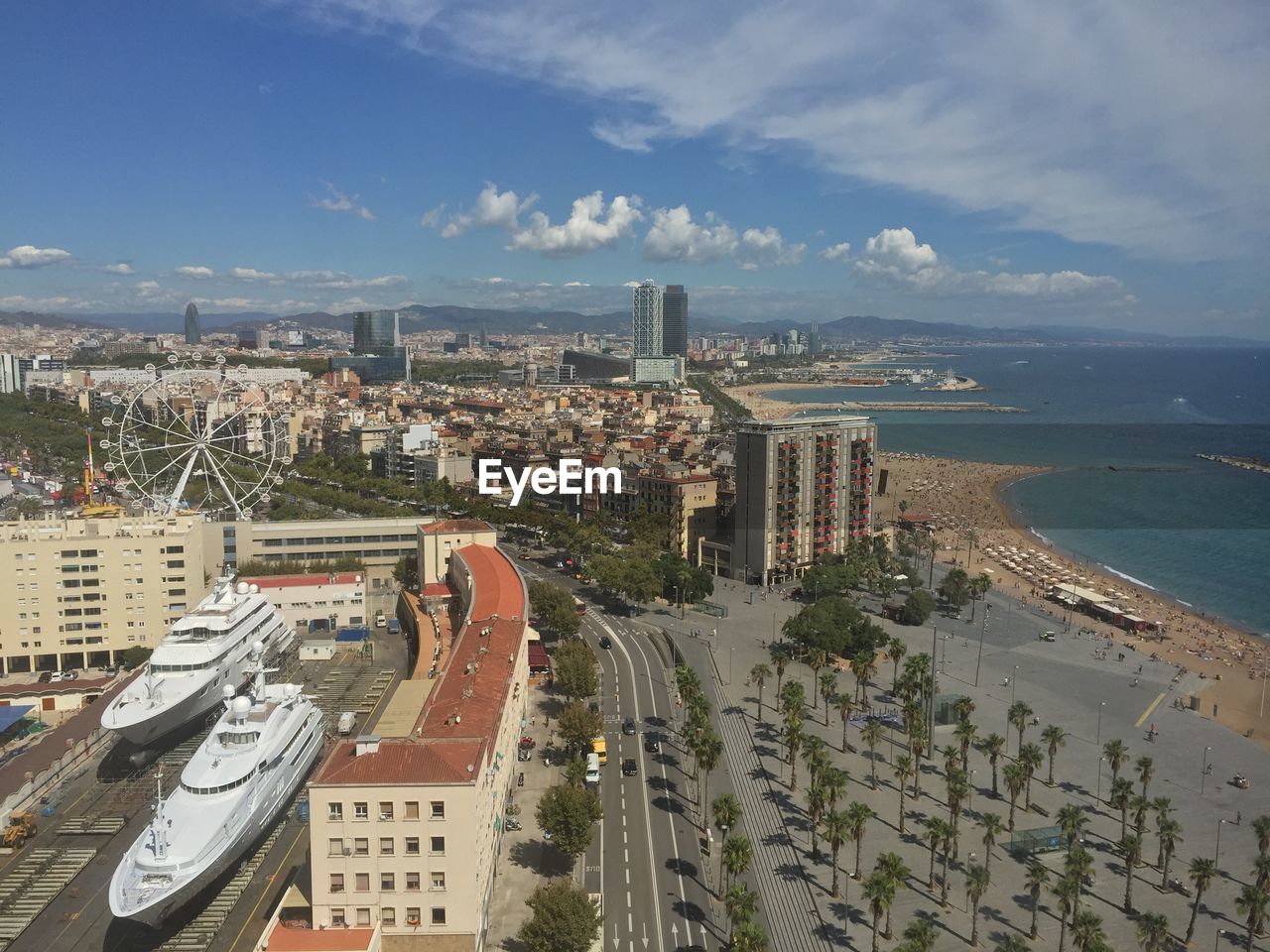 High angle view of city by beach