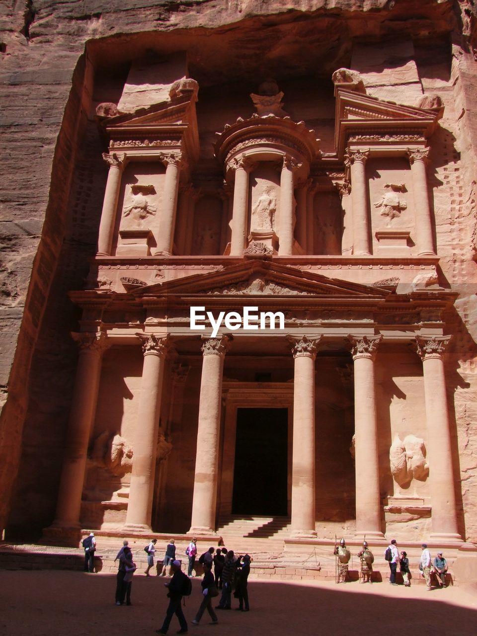 Group of people in front of historical building