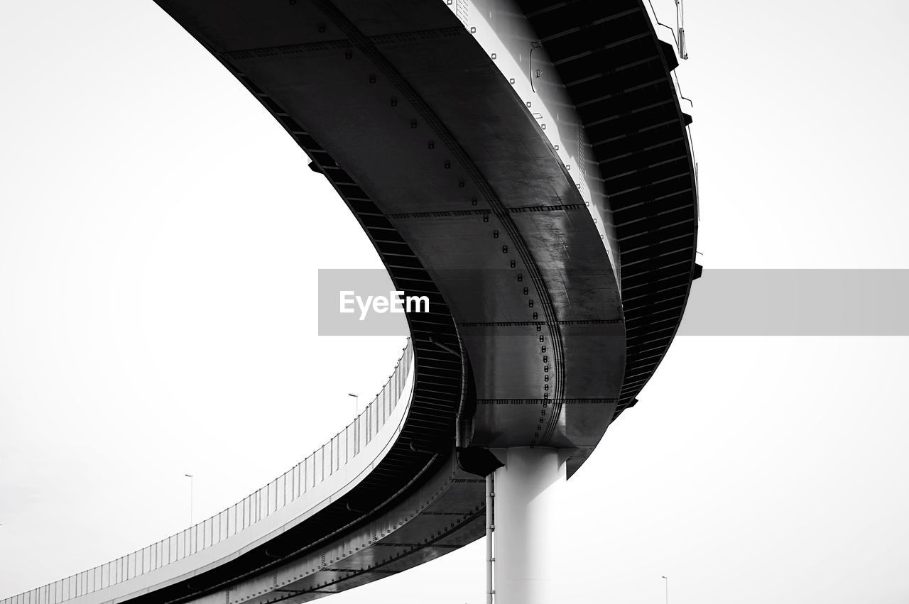 Low angle view of bridge against clear sky