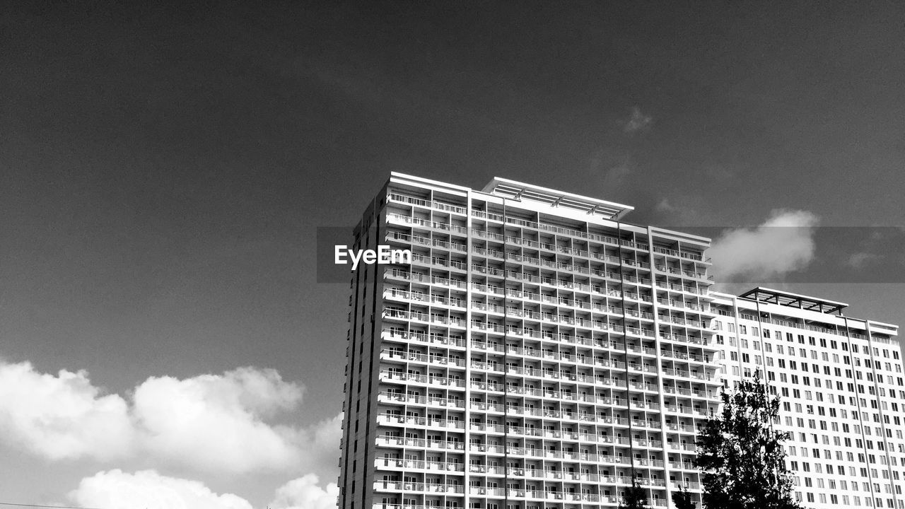 Low angle view of modern building against sky