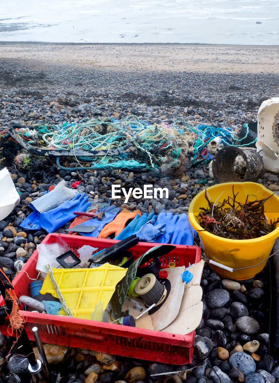 HIGH ANGLE VIEW OF FISHING NET ON SHORE