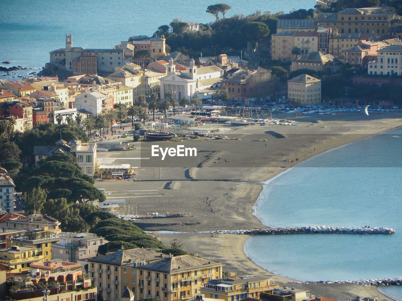 High angle view of town by sea