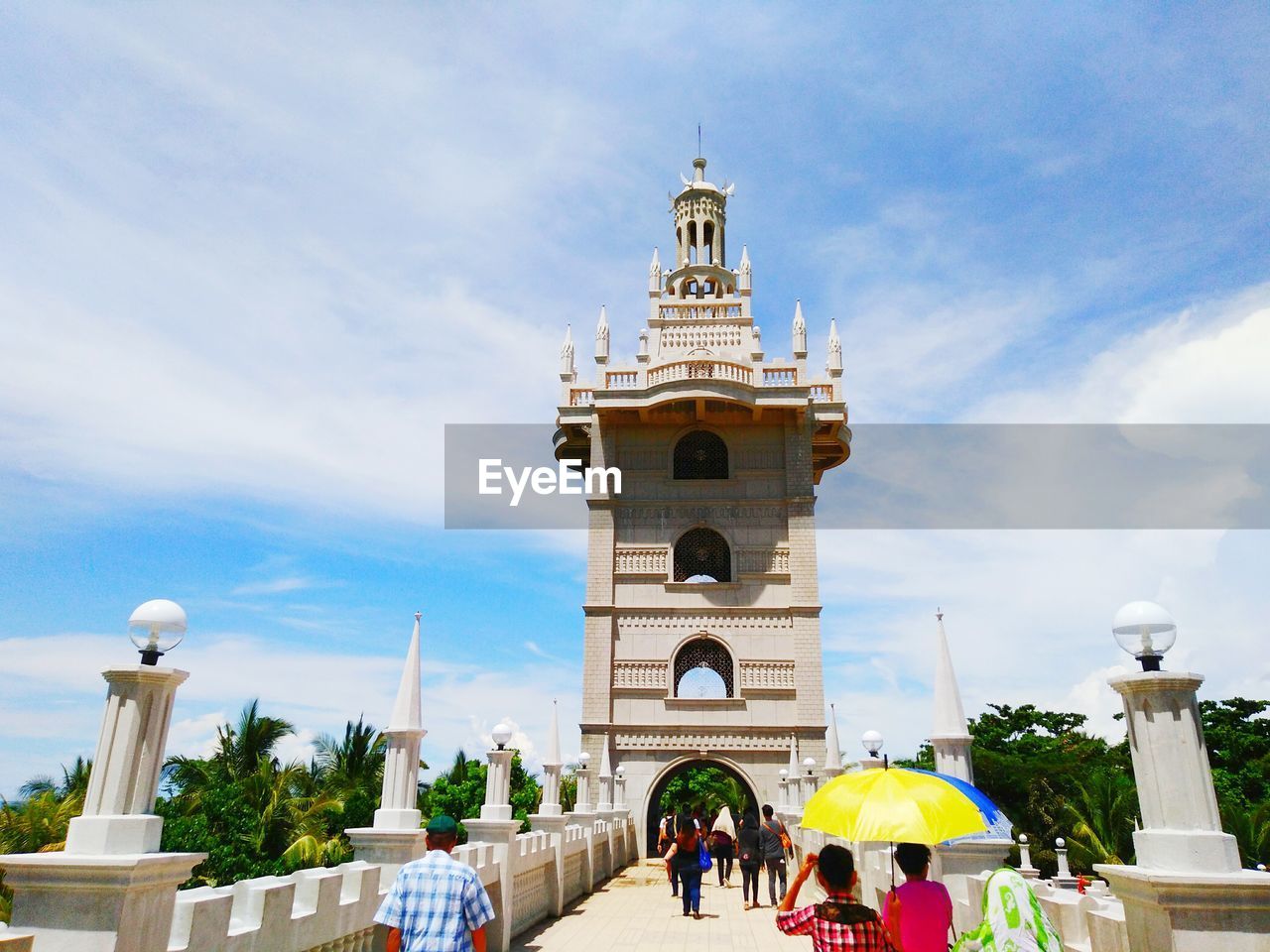 LOW ANGLE VIEW OF CLOCK TOWER AGAINST SKY