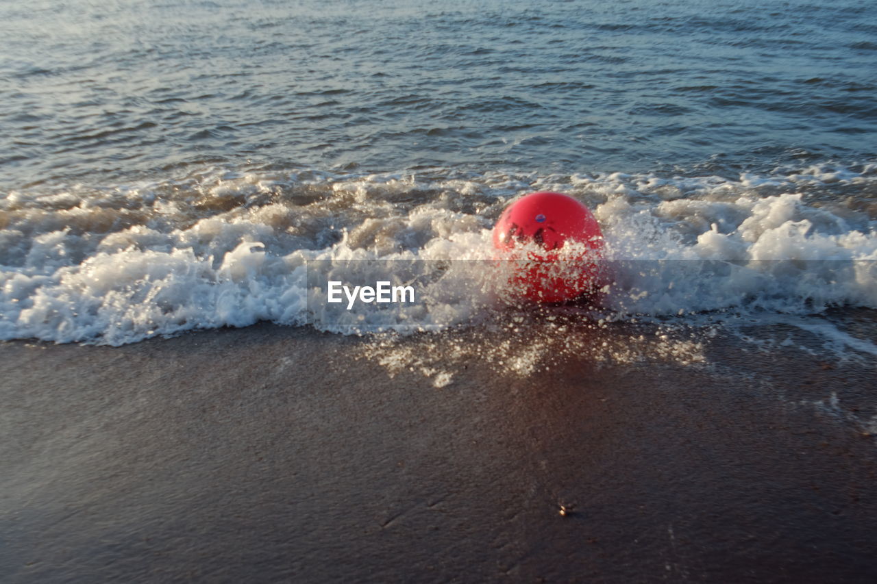 WATER SPLASHING ON SHORE