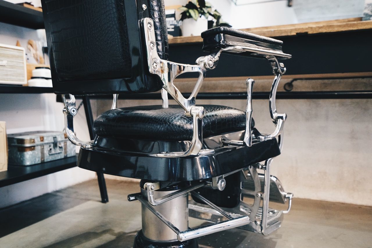 Empty chair at barber shop