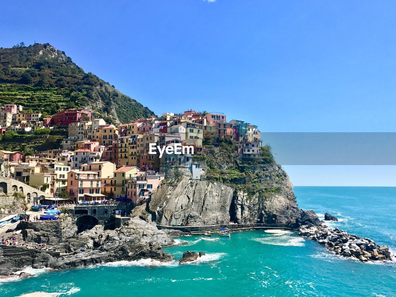 Scenic view of sea against clear blue sky