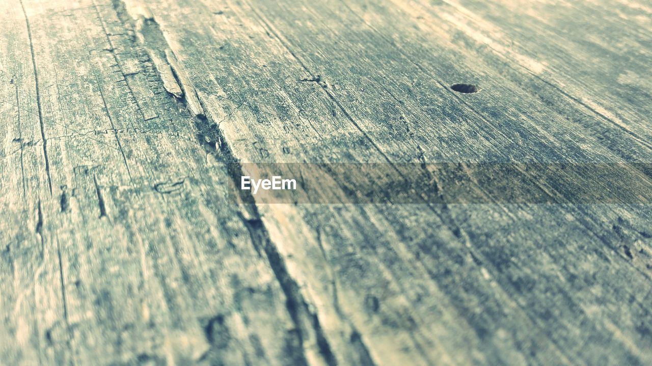 EXTREME CLOSE UP OF WOODEN SURFACE