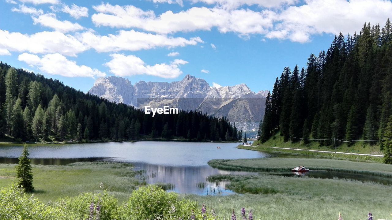 Scenic view of lake with mountains in background