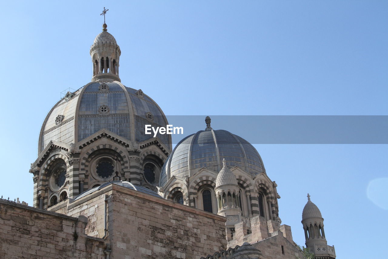 Low angle view of marseille cathedral against clear sky