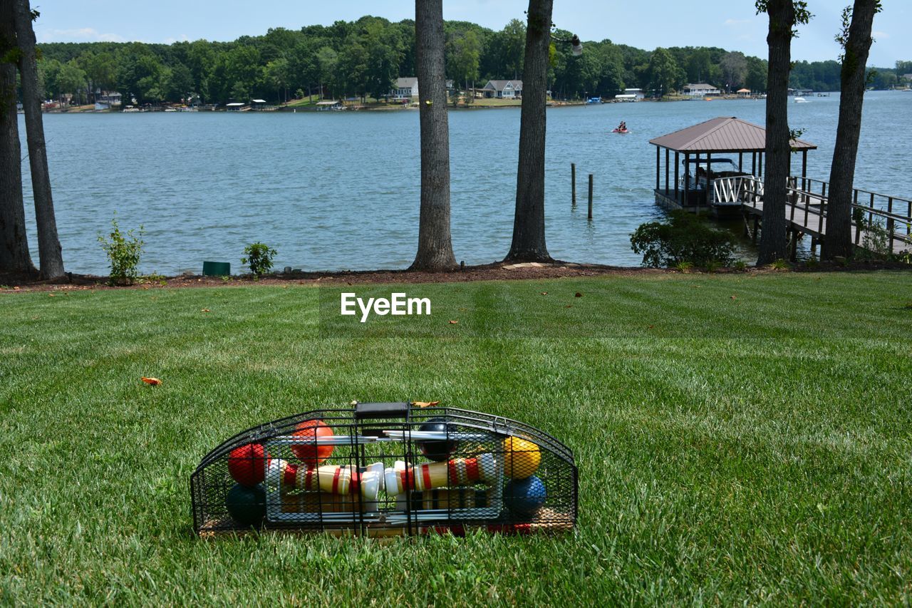 Lakeside croquet set on grass lawn