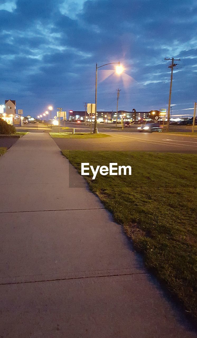 EMPTY ROAD AT SUNSET