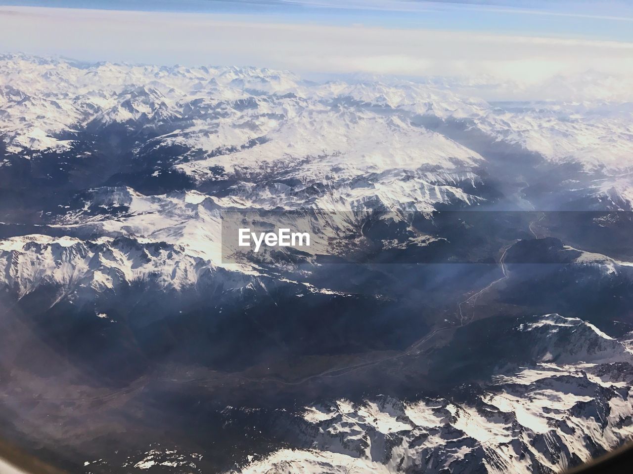 AERIAL VIEW OF SEA AND MOUNTAIN RANGE