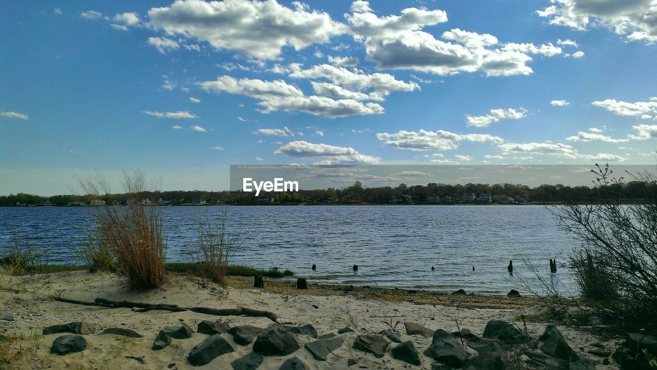 Panoramic view of the cloudy sky above a lake