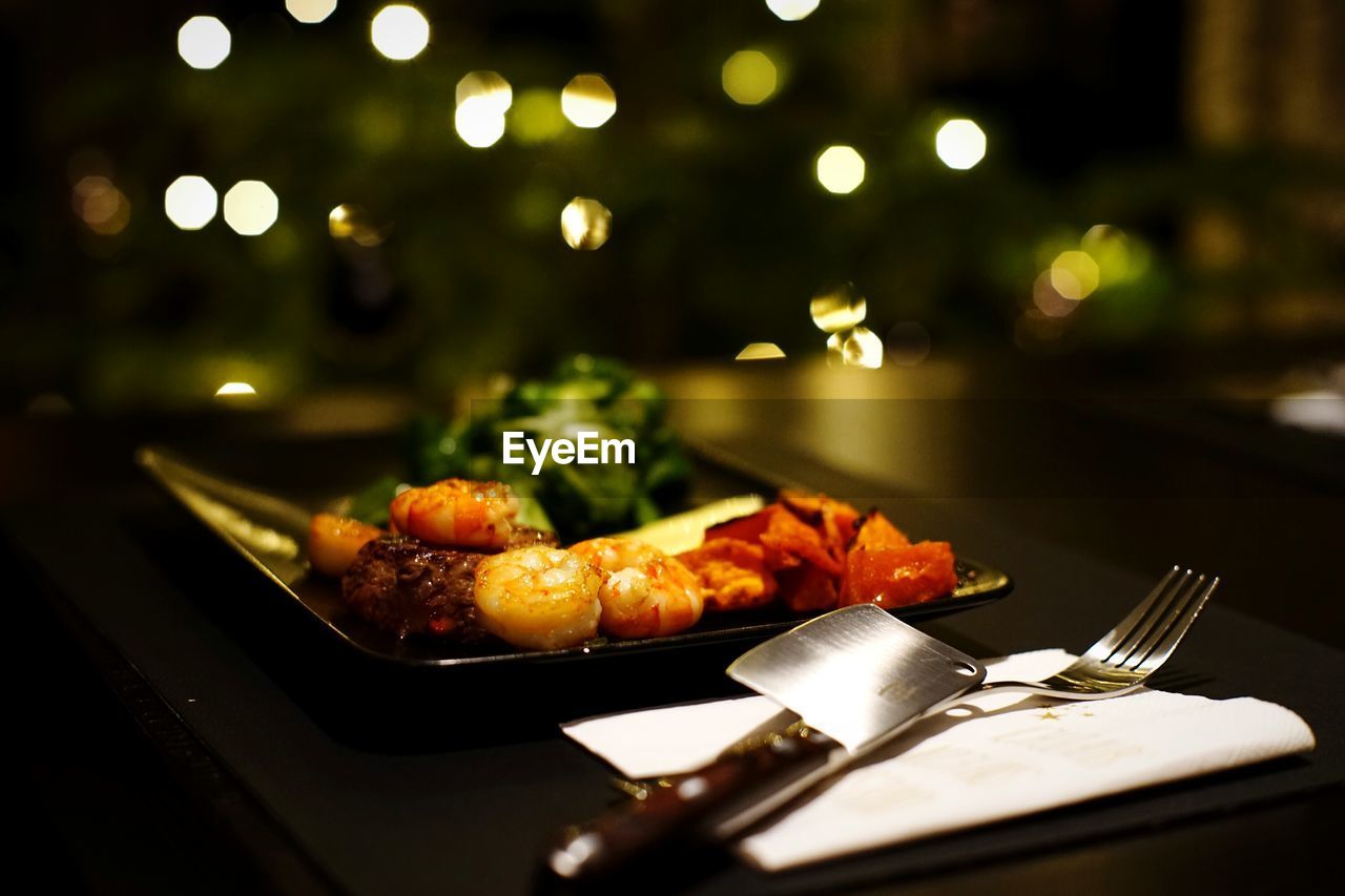 Close-up of food served in plate on table