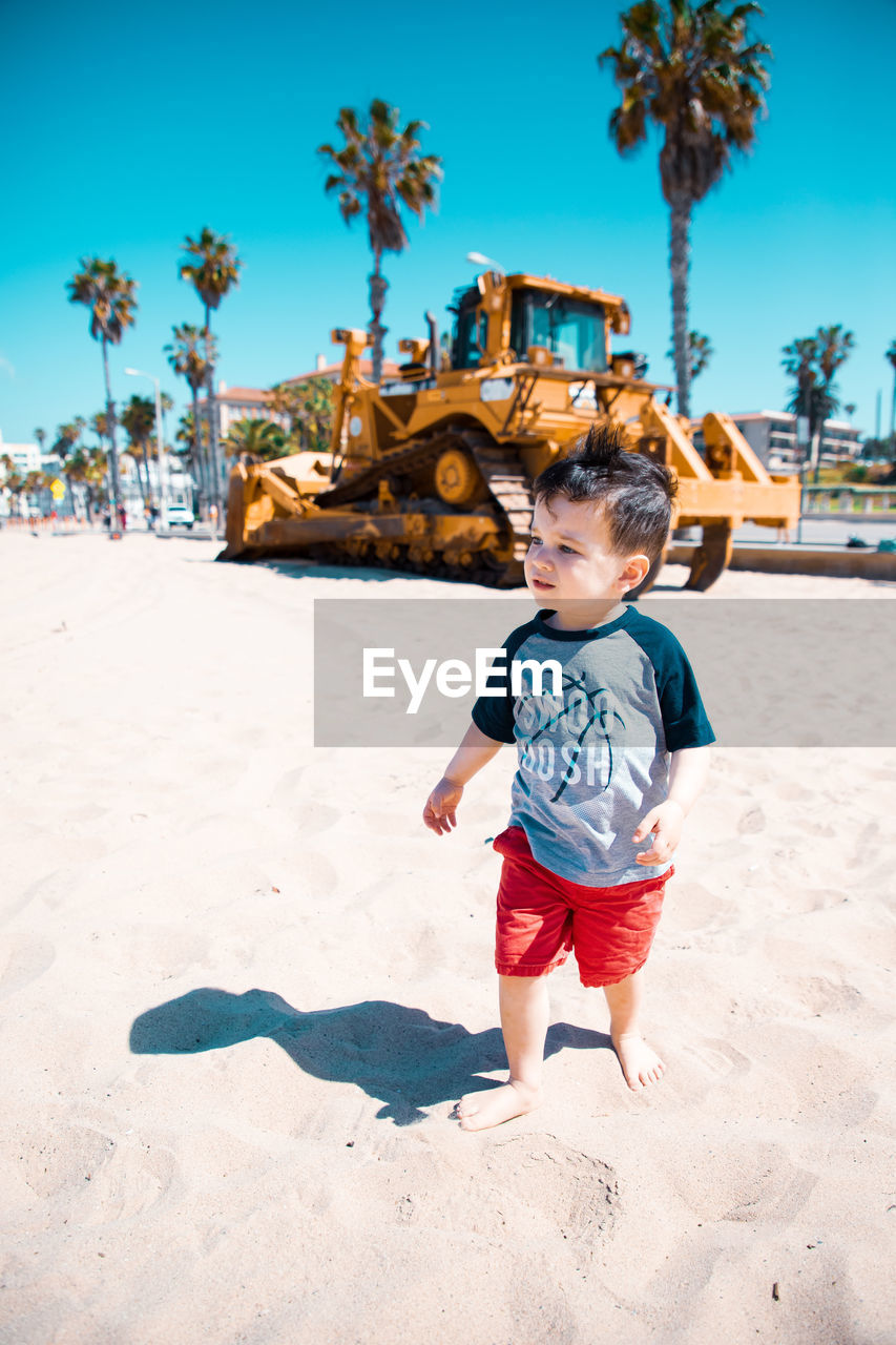 Full length of boy on beach