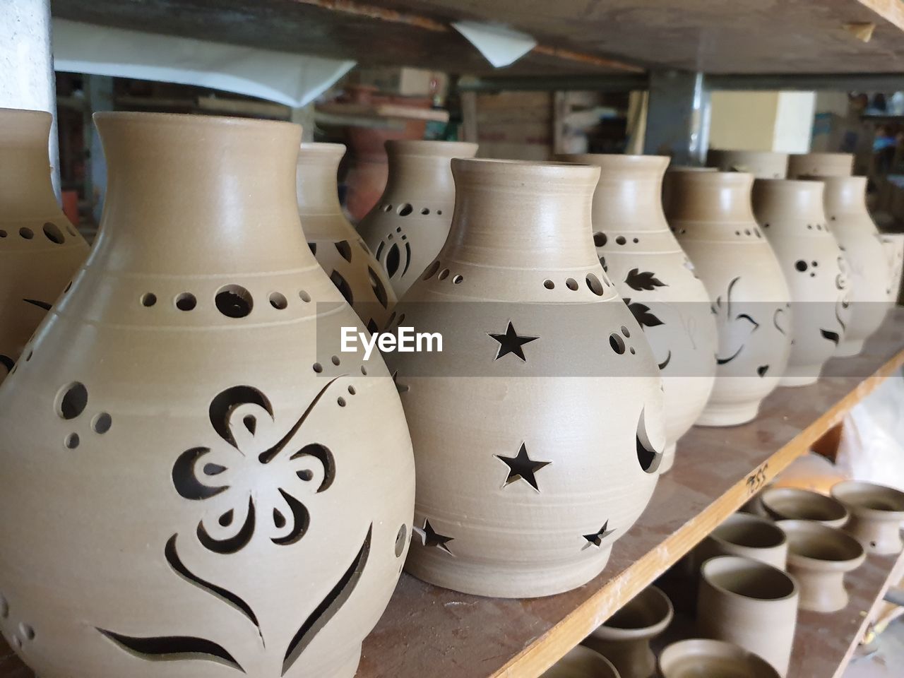 CLOSE-UP OF WHITE OBJECTS FOR SALE IN MARKET