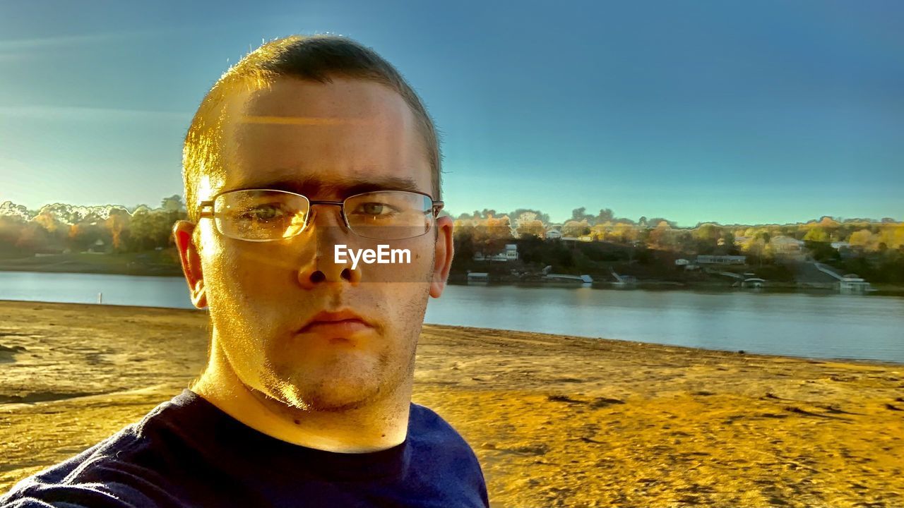 PORTRAIT OF YOUNG MAN IN WATER