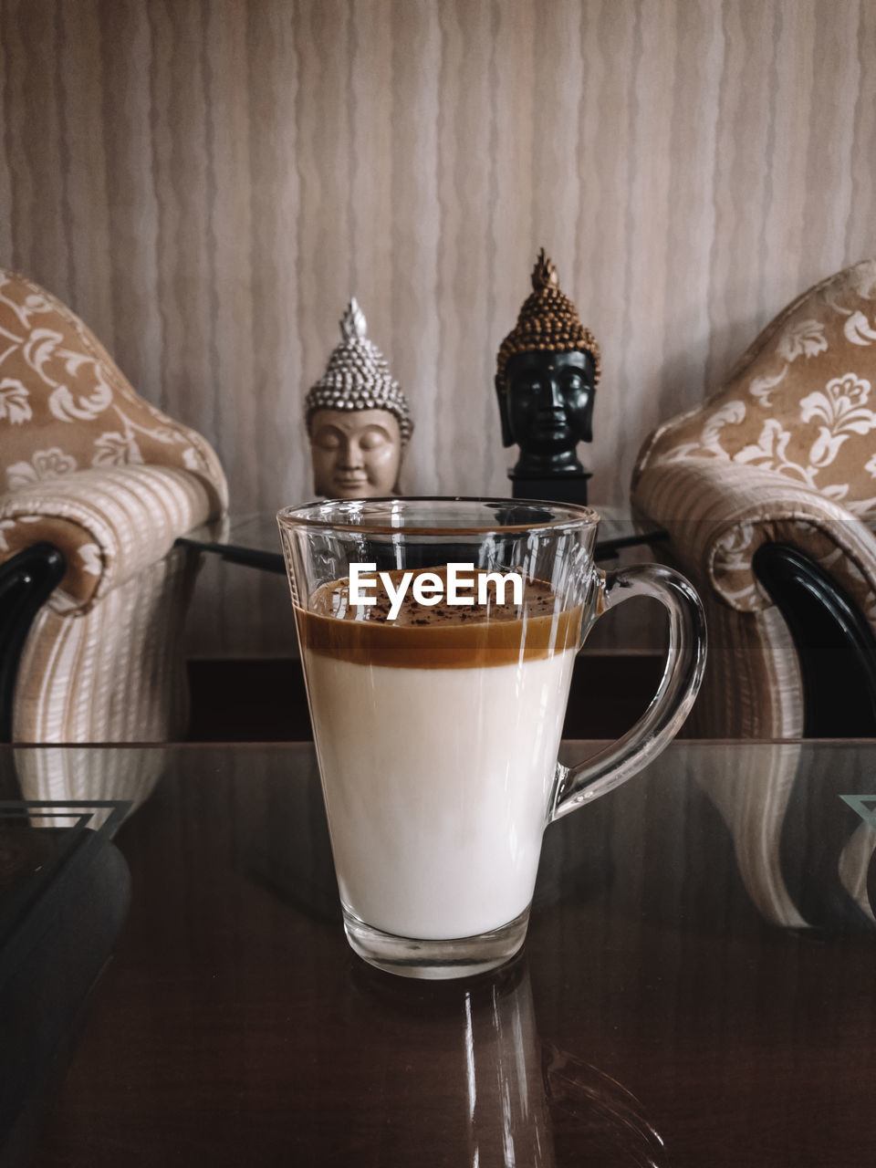 Close-up of coffee served on table