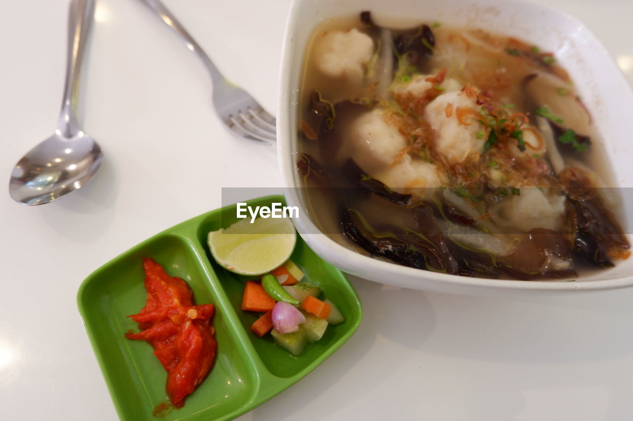 HIGH ANGLE VIEW OF MEAL SERVED ON TABLE